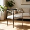 Minimalist Curved Arm Dining Chair, Matte Black Metal Frame with Cream Fabric Cushion